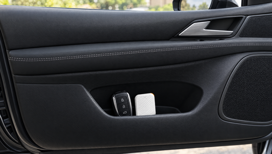 Tack GPS tracker next to a car key in a car door pocket, no wiring needed